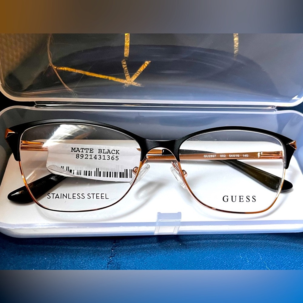 Brand new. Guess eyeglasses. Black & Gold
